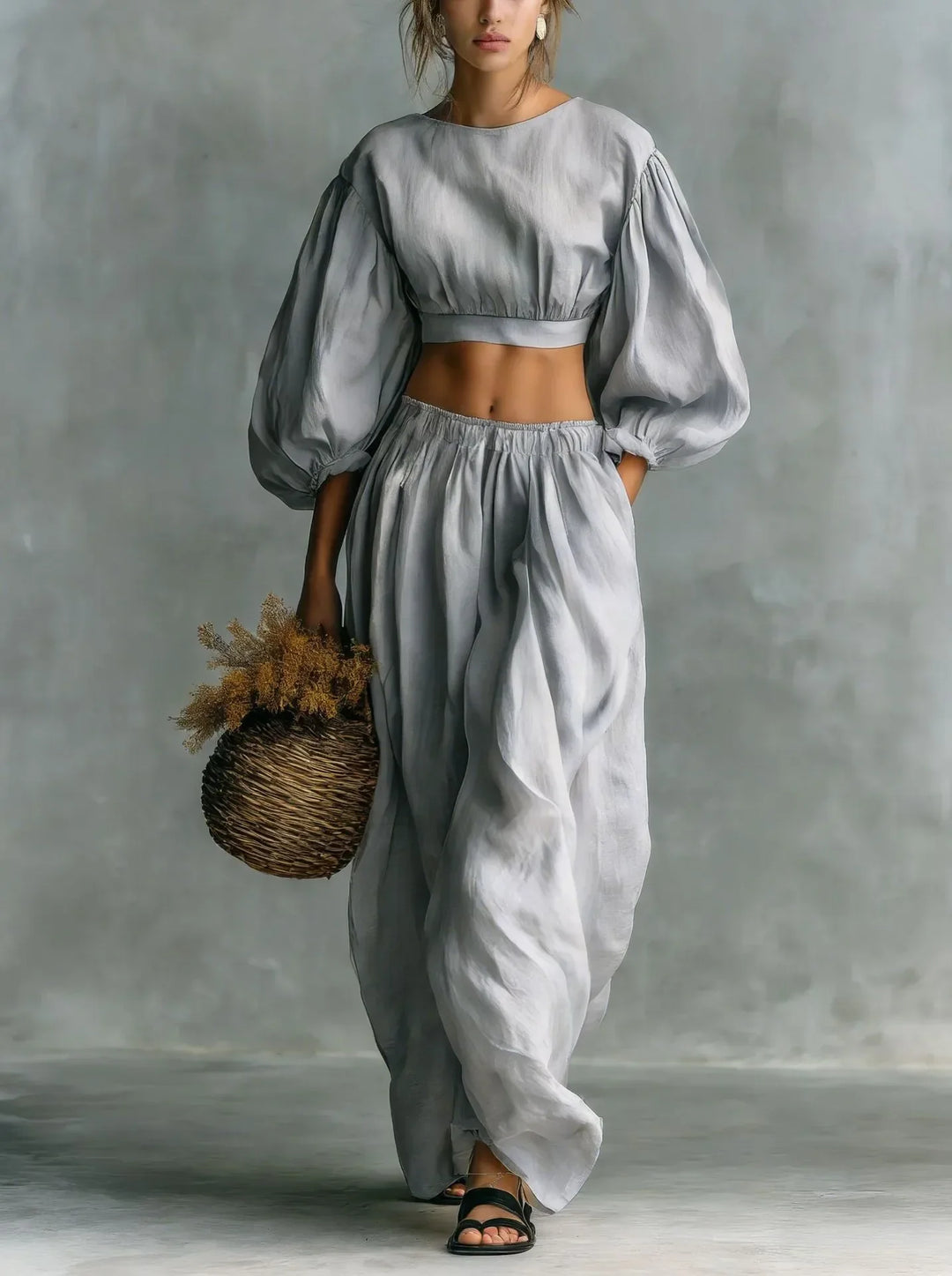 Modern women's balloon sleeve cropped top and wide-leg trouser set, a chic and comfortable two-piece outfit.