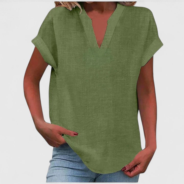 Stylish women's V-neck blouse, great for work or casual wear, offering effortless chic.