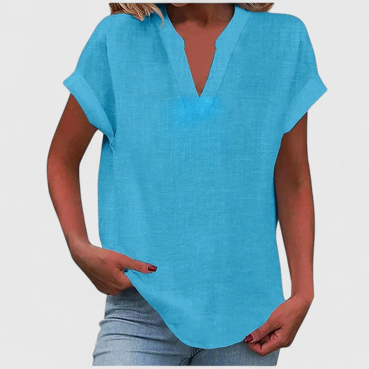 Versatile women's V-neck blouse, comfortable & stylish for work, casual, or summer fashion.