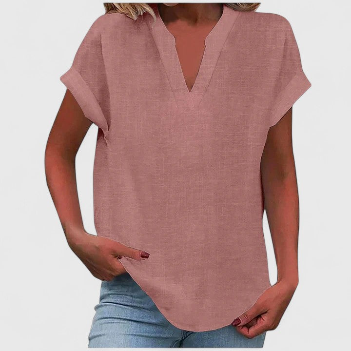 Effortless style with this comfortable women's V-neck blouse, perfect casual fashion.