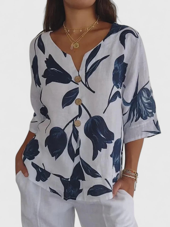 Women's comfortable V-neck blouse with elegant floral print & long sleeves. Perfect for casual or spring wear.