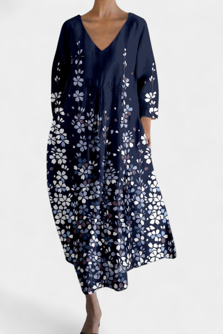 Versatile & comfortable V-neck maxi dress for women, suitable for casual or elegant summer occasions.