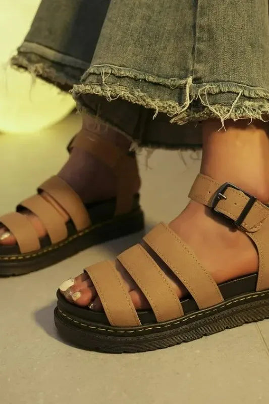 Chic women's flat sandals for walking, perfect for summer. Features comfortable open-toe & lightweight design.