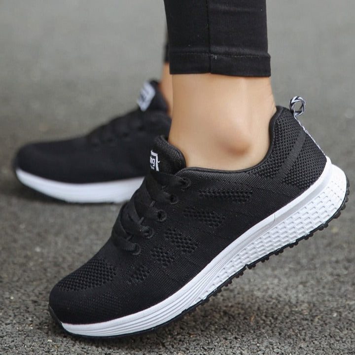 Slip-resistant women's walking shoes, offering stability, arch support & daily comfort.
