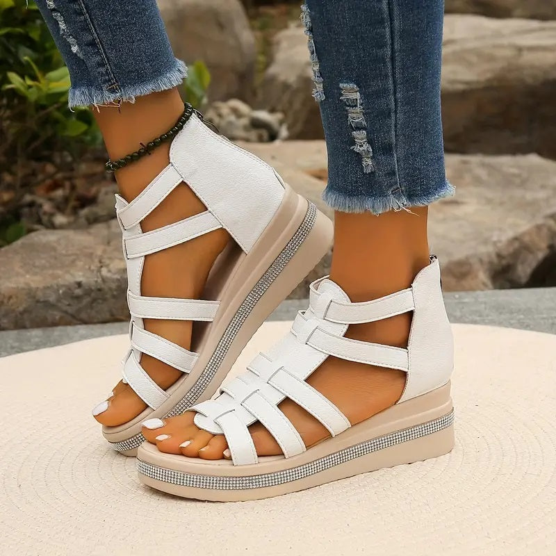 Comfortable women's wedge sandals featuring a cushioned sole, perfect elevated footwear for casual summer days.