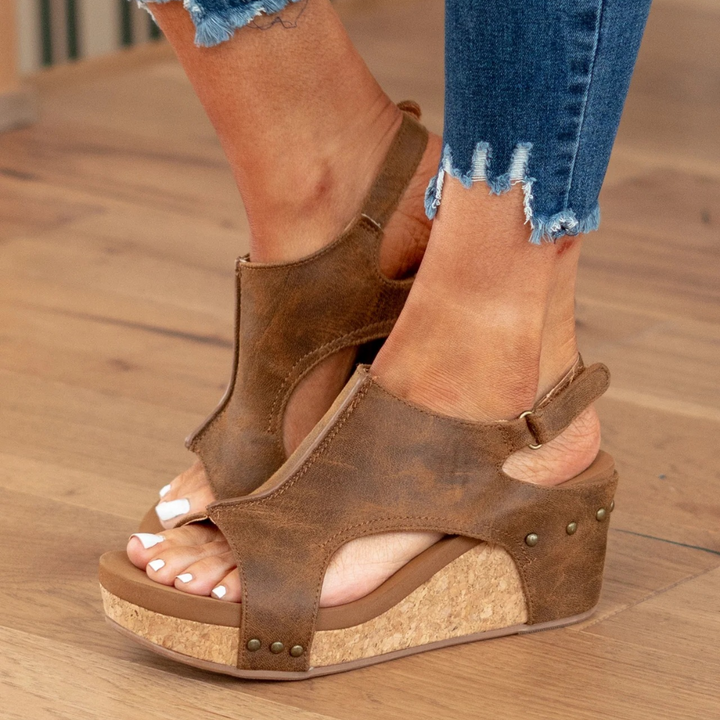 Comfortable women's wedge sandals with soft elastic straps. Ideal for stylish, supportive summer everyday wear.