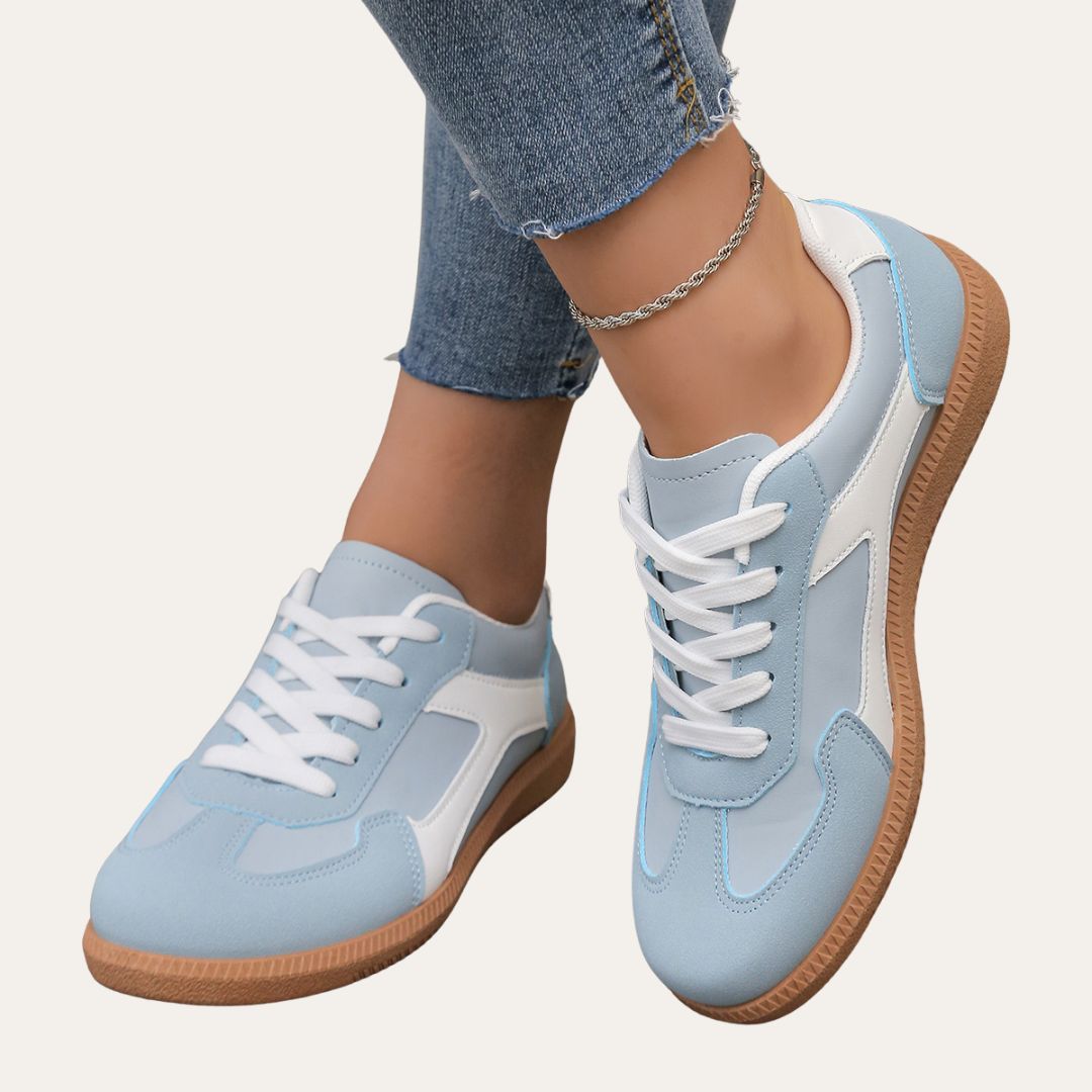 Stylish women's sneakers, low top design for casual outfits and comfortable walking.