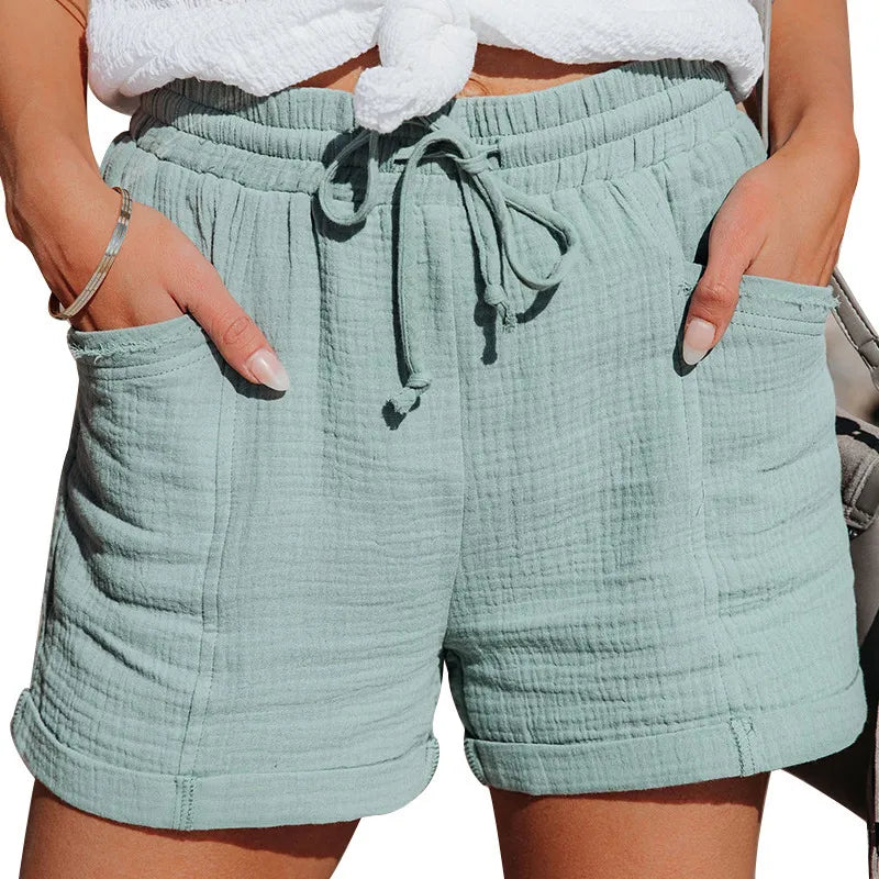 Easy pull-on women's shorts with a comfy drawstring waist and functional pockets, great for summer.