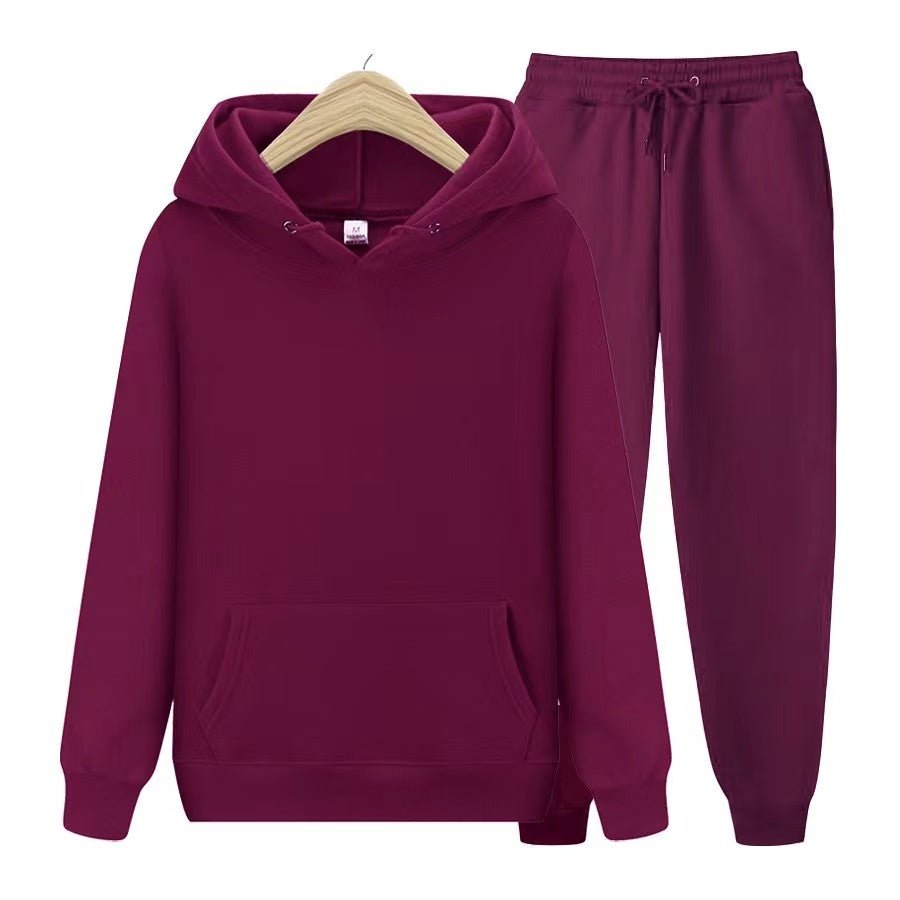 Back view: Women's relaxed fit hooded sweatshirt & jogger set, showing clean design for casual wear.