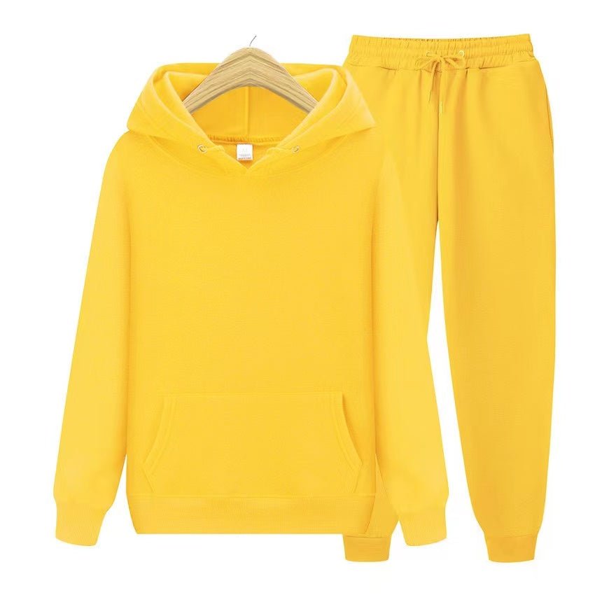 Close-up: Soft, comfy fabric texture of the women's hooded sweatshirt & jogger set. Quality loungewear.