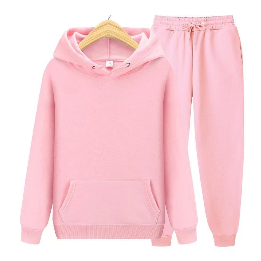 Relaxed fit women's hoodie & jogger set. Features drawstring hood and comfortable cuffs for ultimate coziness.