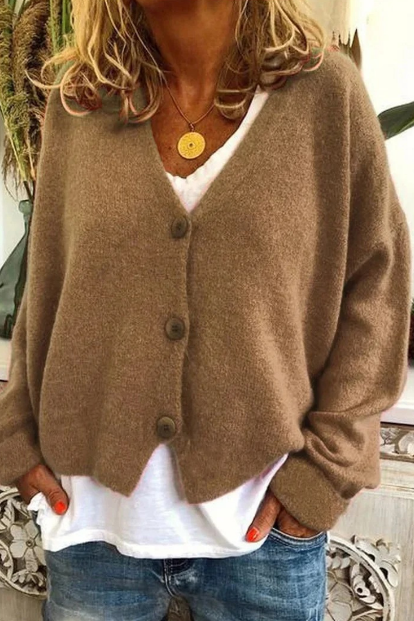 Professional women's button cardigan, a chic office wear layering sweater.
