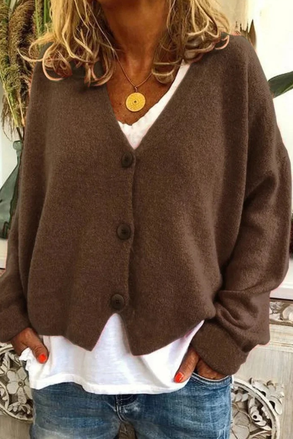 Chic women's button cardigan, a cozy sweater for modern fall fashion.