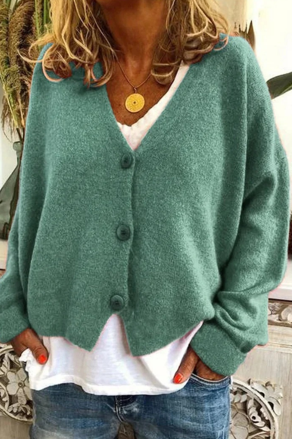 Soft knit women's button cardigan, a cozy sweater for comfortable layering.