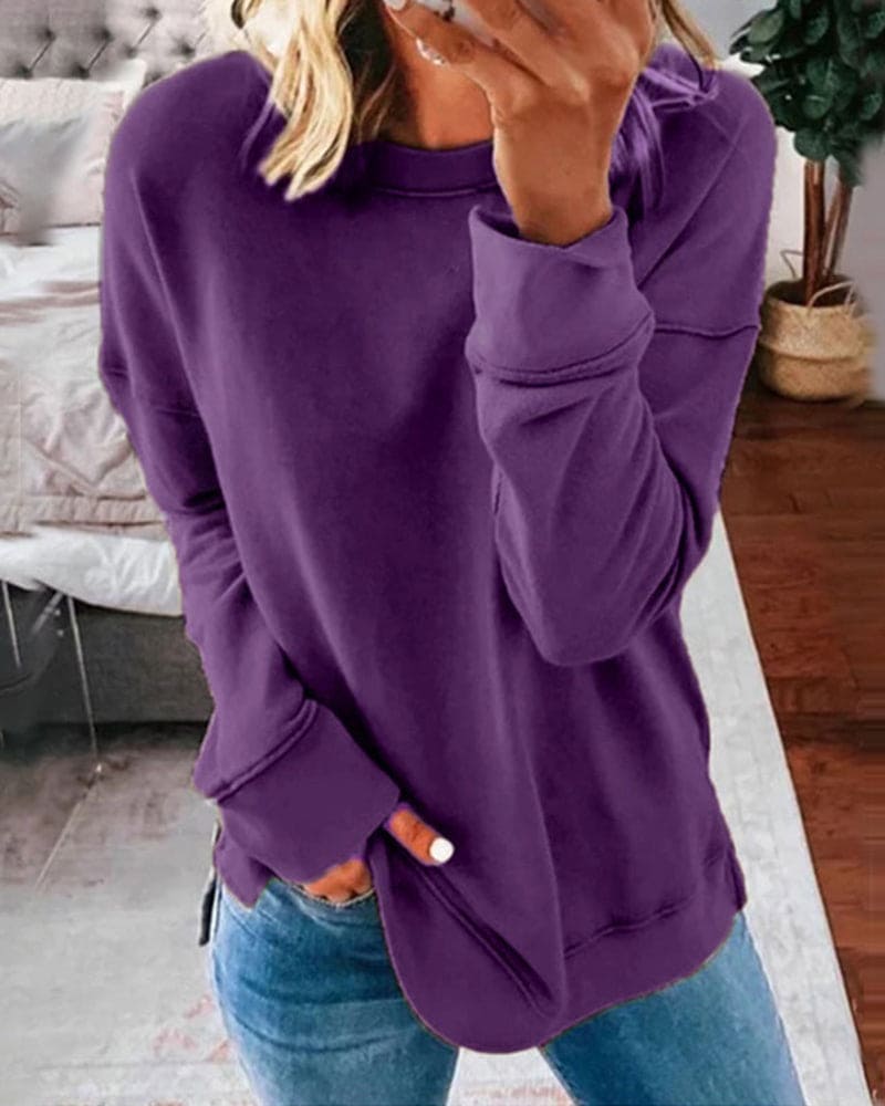Women's soft cozy crewneck sweatshirt, a classic long-sleeve top for versatile layering & comfortable everyday wear.