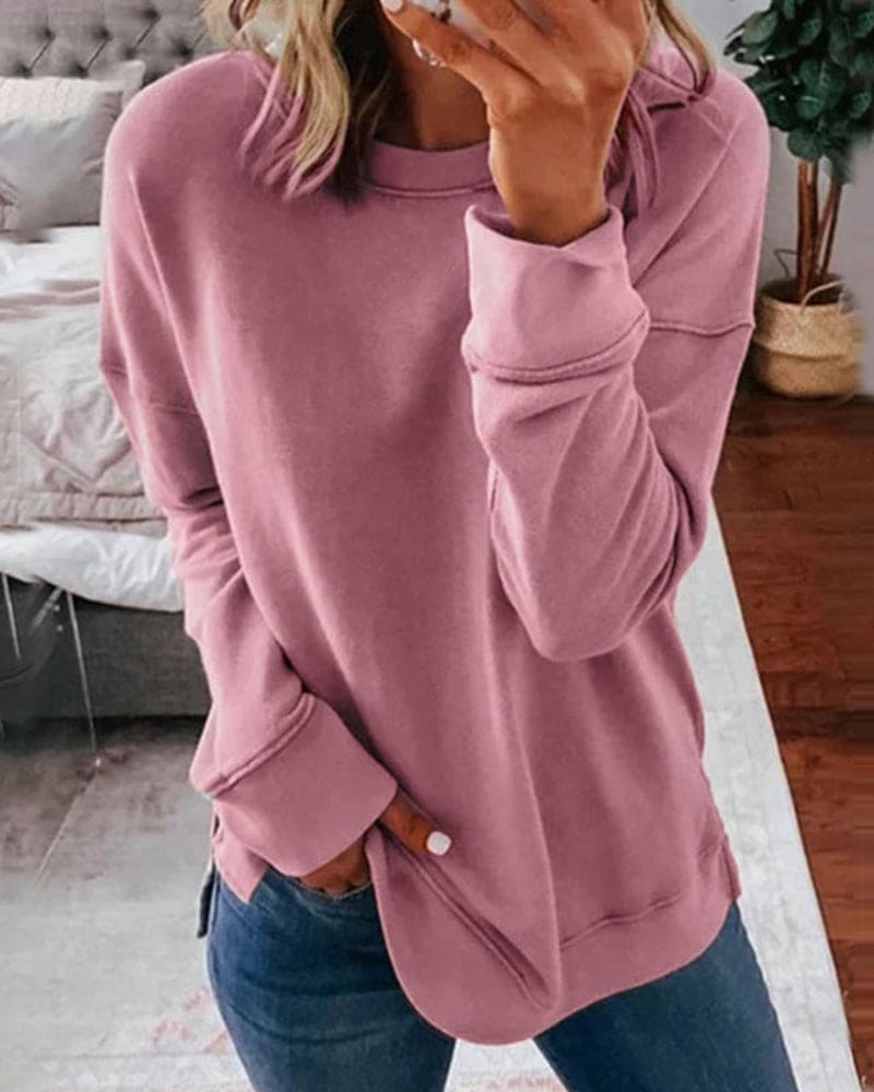 Versatile women's classic crewneck sweatshirt, soft & cozy for layering or everyday comfort and casual wear.