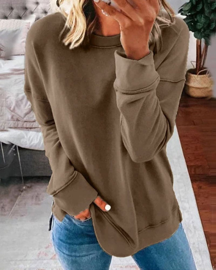 Plush, soft women's crewneck sweatshirt, ideal cozy loungewear for everyday comfort and relaxed casual style.