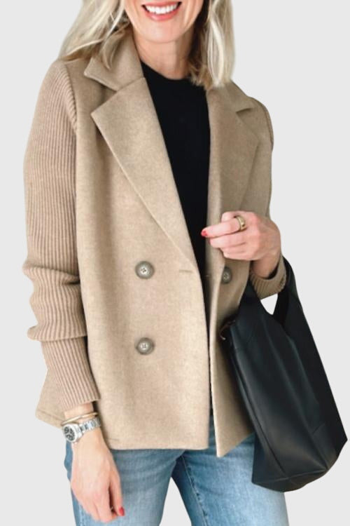 Comfortable women's double-breasted blazer. Versatile, tailored fit with modern contrast sleeves for chic layering.