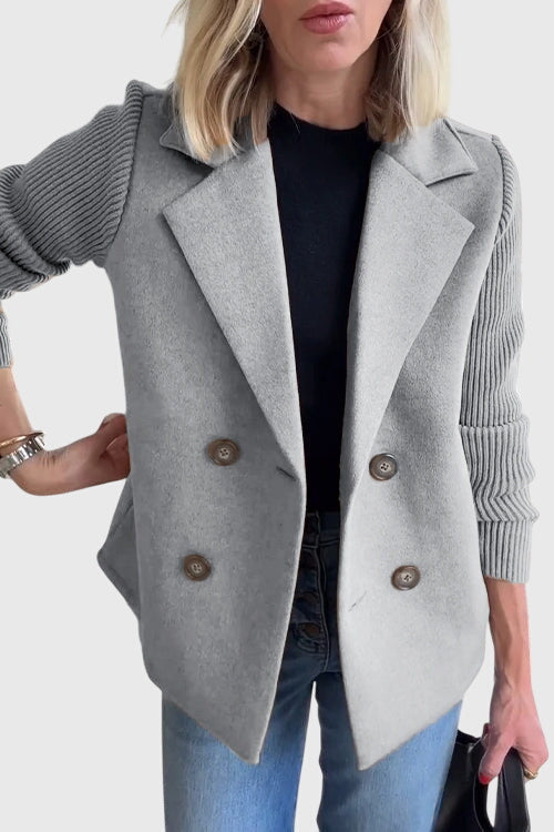 Women's comfortable double-breasted blazer with contrast sleeves, great for stylish office wear or everyday fashion.