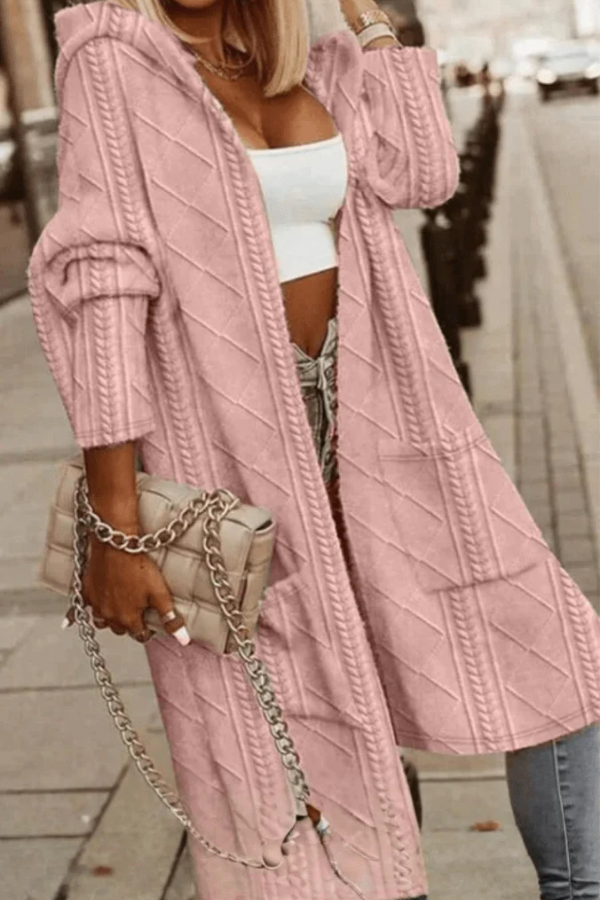 Warm women's hooded cardigan, ideal fall/winter layering piece for cozy, casual fashion.