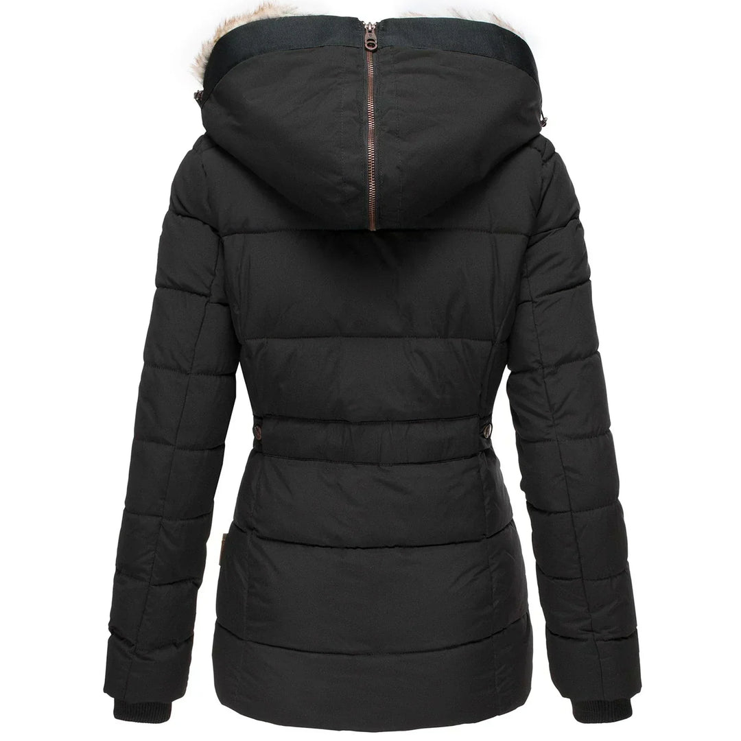 Versatile women's insulated winter jacket, ideal for outdoor adventures & extreme cold comfort.
