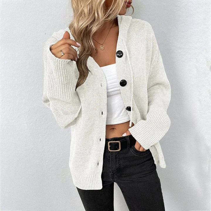Soft women's knit cardigan featuring a hood and open front with buttons, for a cozy casual look.
