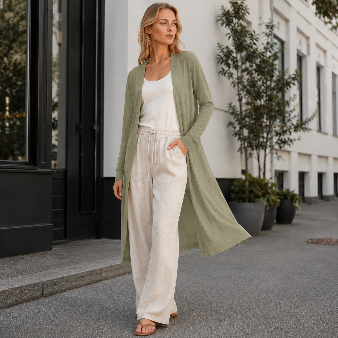 Versatile women's long knit cardigan layered over various outfits, perfect for any occasion.