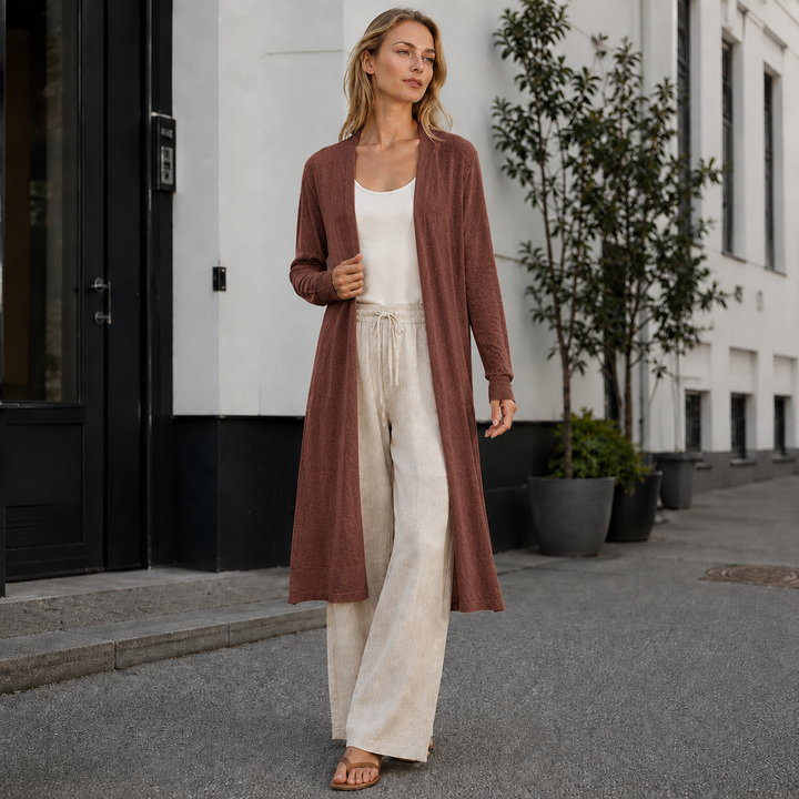 Stylish woman wearing a long knit cardigan, perfect for casual fall outfits & everyday wear.