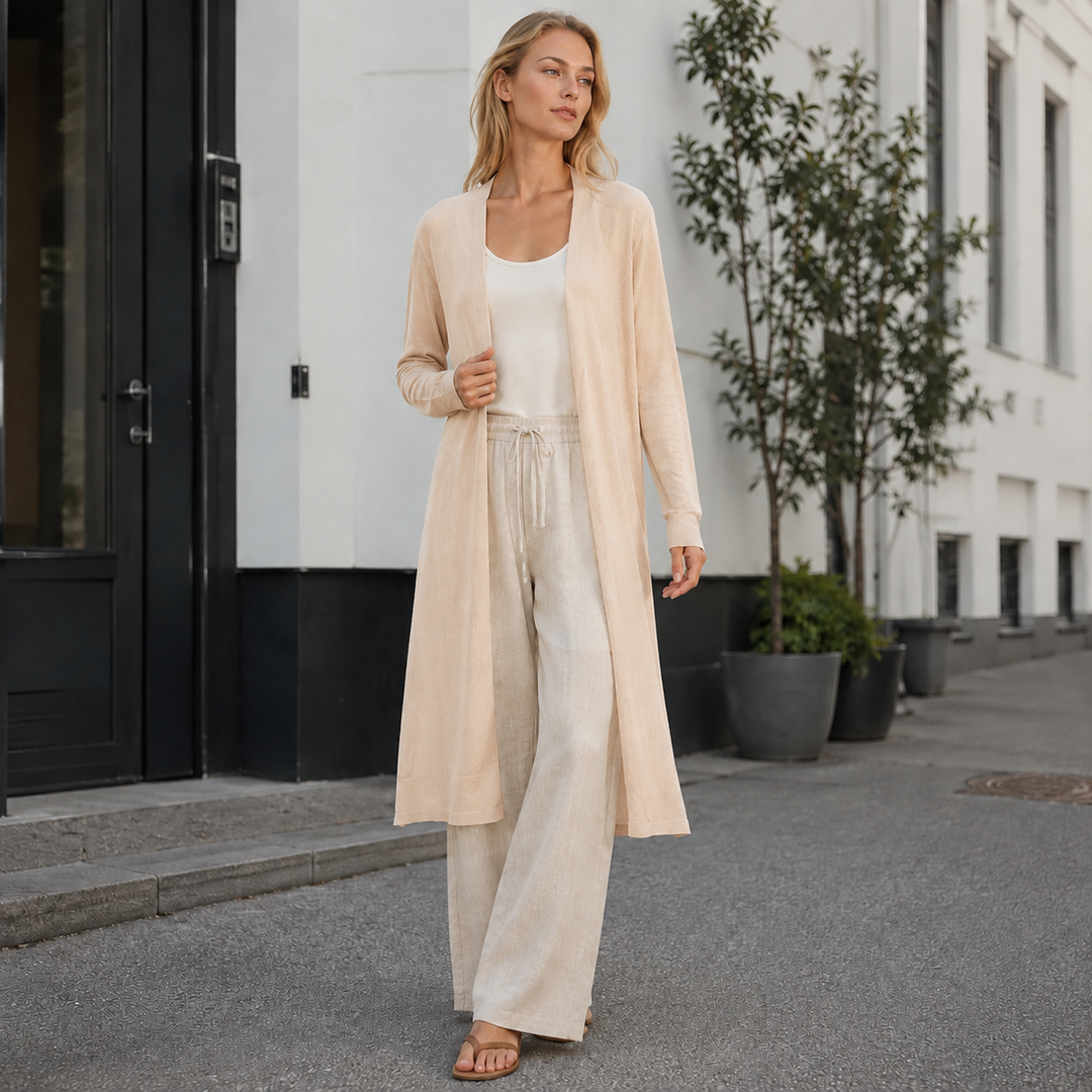 Elegant women's long knit cardigan, ideal for versatile fall fashion & chic layering.