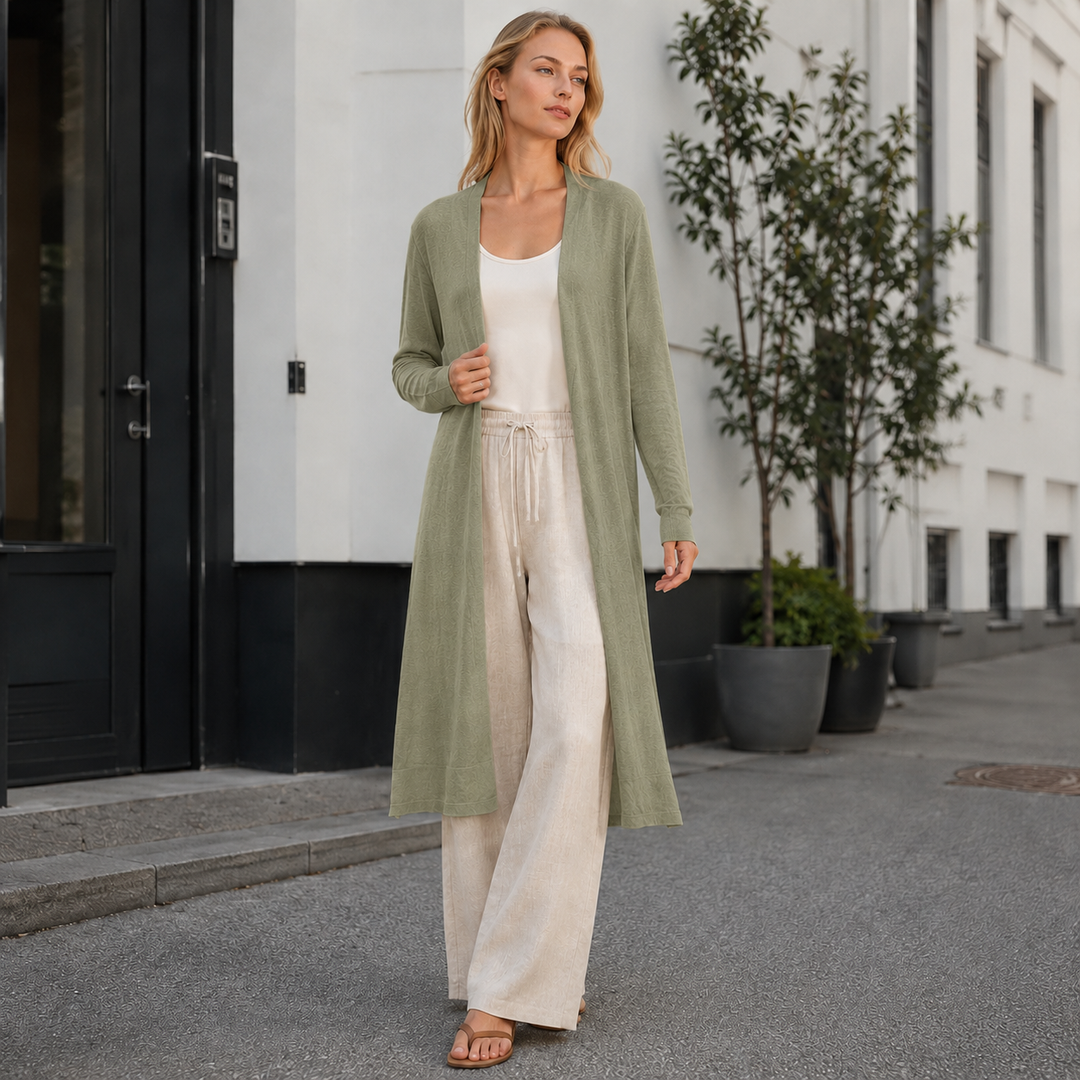 Front view of a beautiful women's cozy long knit cardigan, a must-have for winter fashion.