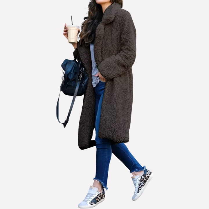 Elegant women's longline teddy coat. Cozy and stylish outerwear jacket, perfect for fall and winter fashion.