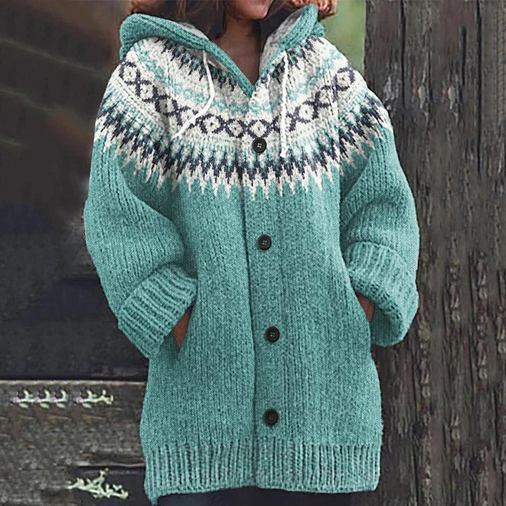 Versatile women's Nordic hooded knit cardigan for autumn style & winter warmth. Features button closure & cozy design.