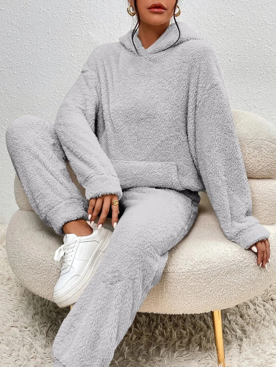 Side view of woman wearing a cozy plush loungewear set, soft and perfect for comfortable casual wear.