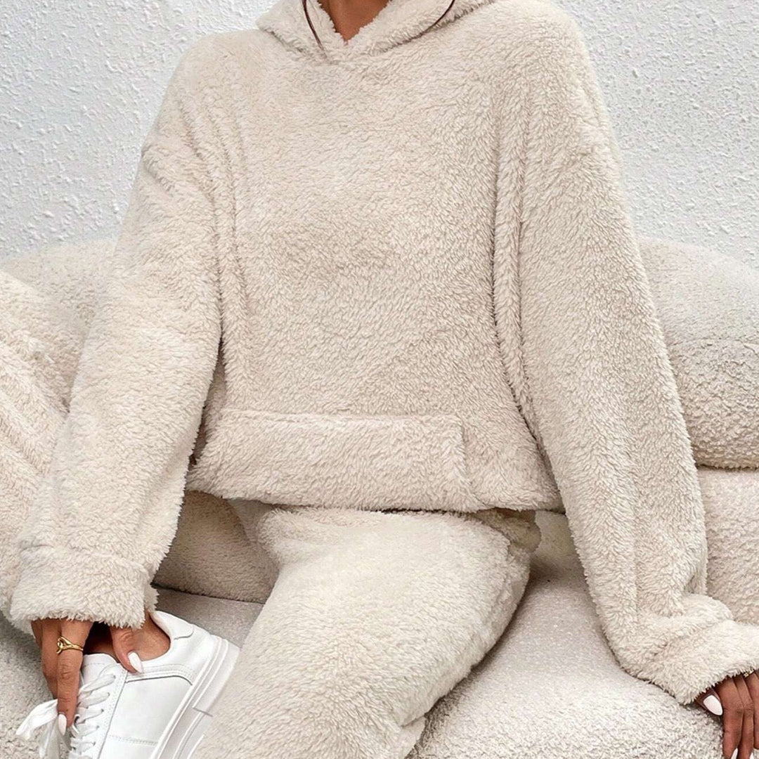Close-up of soft plush fabric detail on women's cozy loungewear set, a winter essential for comfort.