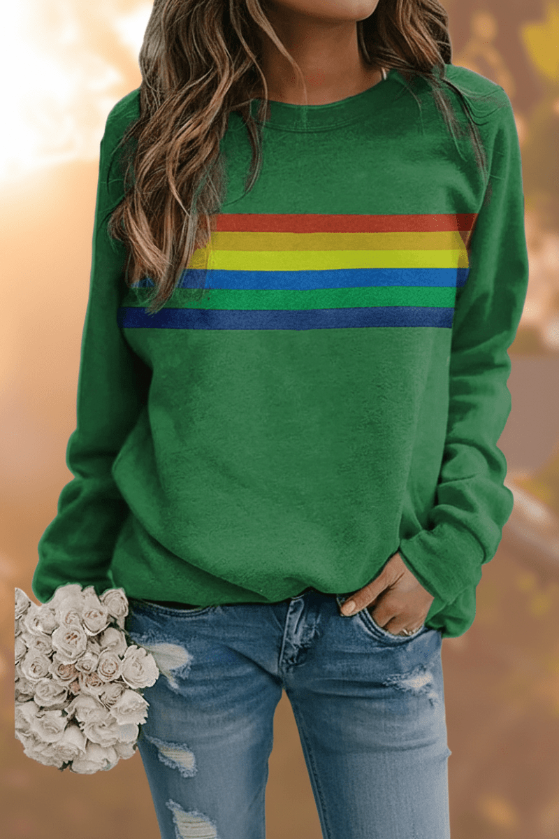 Stylish women's rainbow striped sweatshirt, a cozy long-sleeve pullover for comfortable casual outfits.