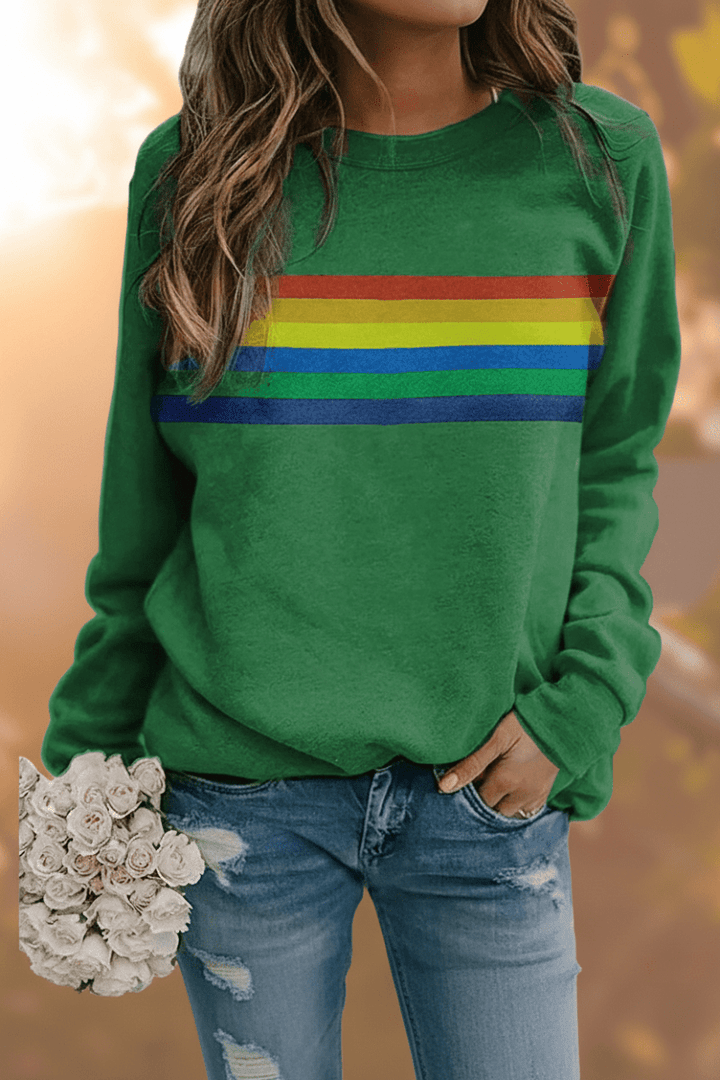 Stylish women's rainbow striped sweatshirt, a cozy long-sleeve pullover for comfortable casual outfits.