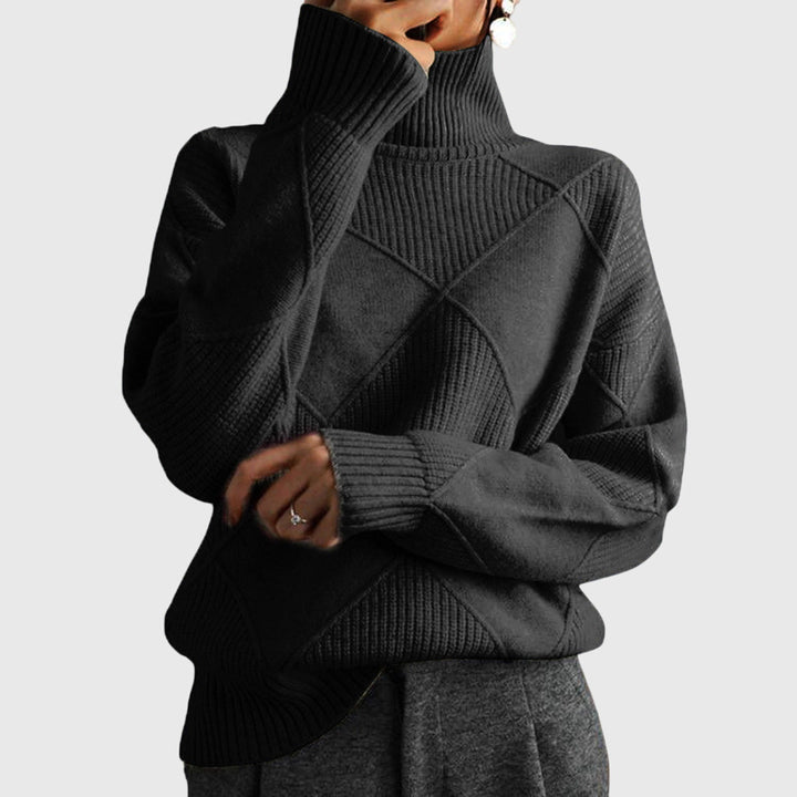 Women's relaxed fit jumper, roll neck, with a distinctive diagonal seam, perfect cozy winter wear.