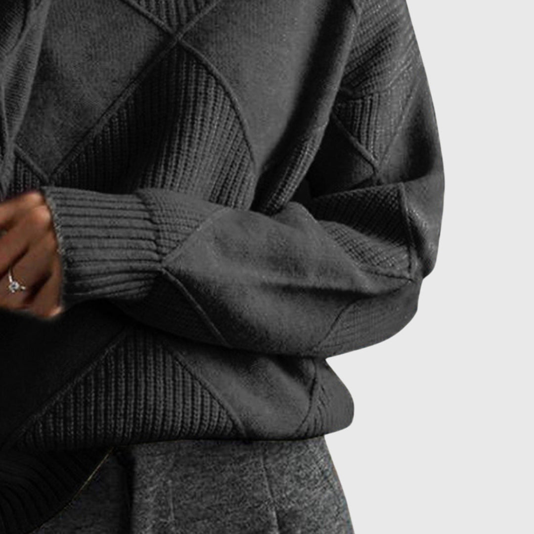 Chunky knit women's roll neck sweater, oversized, cozy, with a stylish diagonal seam, winter fashion.