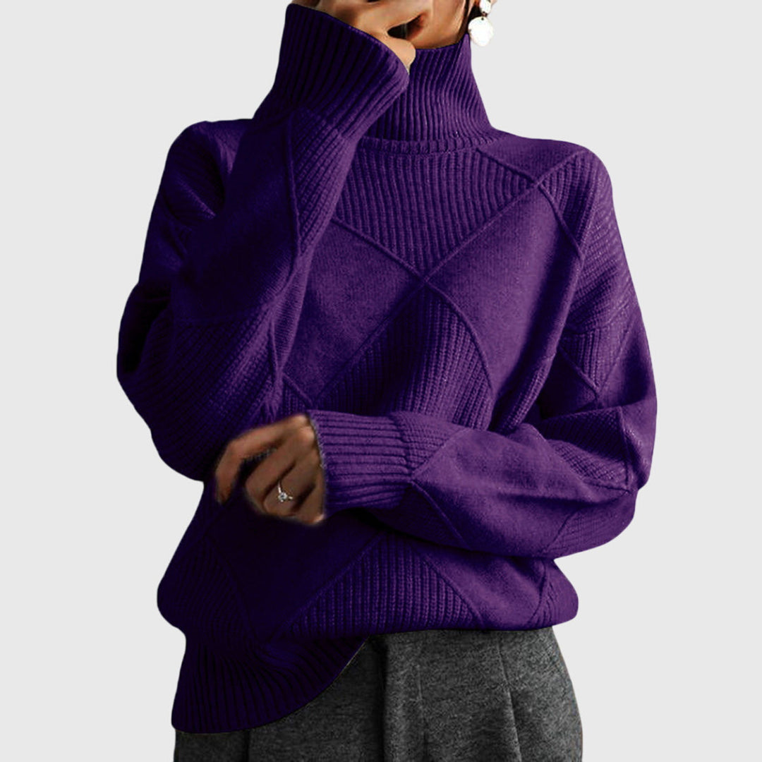 Close-up of diagonal seam on a soft women's roll neck sweater, highlighting quality and design.