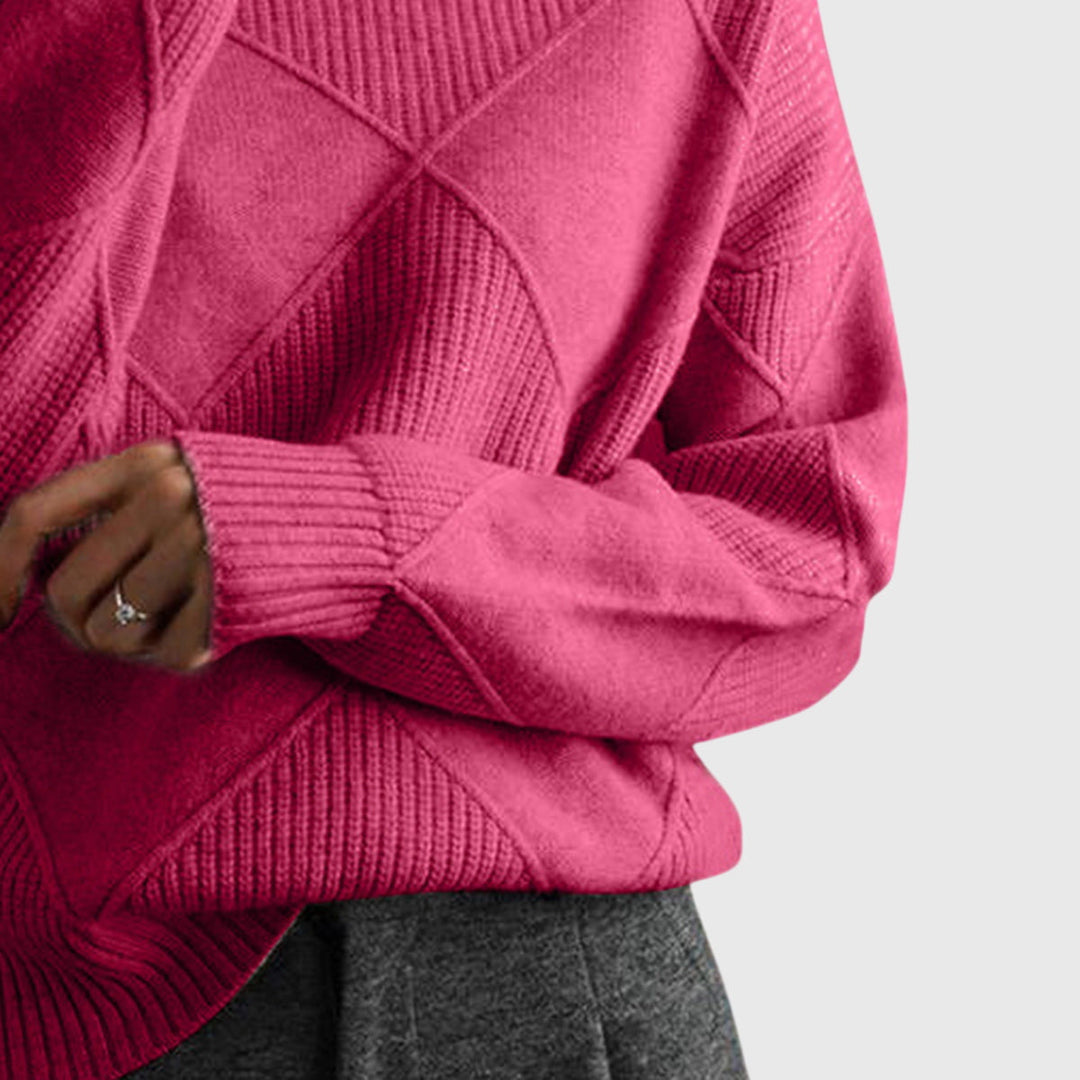 Oversized women's roll neck jumper, relaxed fit, perfect for cozy cold weather fashion.