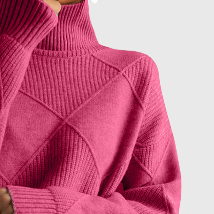 Stylish diagonal seam on a warm women's roll neck sweater, ideal for winter comfort.