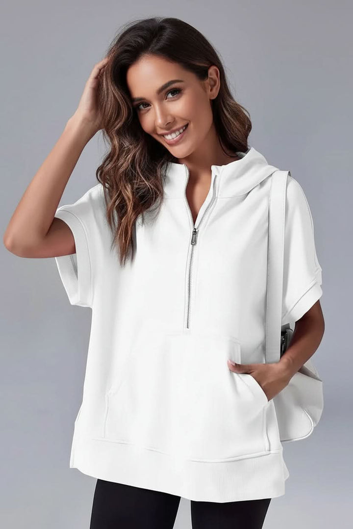 Comfortable short sleeve hoodie for women, featuring a half-zip and relaxed fit for casual style.