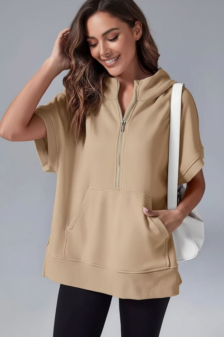 Women's relaxed fit short sleeve hoodie, a cozy half-zip pullover ideal for loungewear and casual outfits.