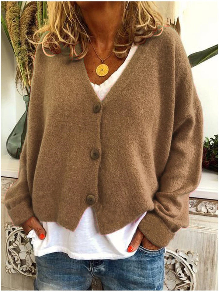 Women's cozy soft open front cardigan in a neutral color, perfect for everyday layering comfort.