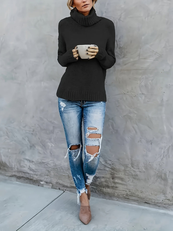 Warm women's cozy turtleneck sweater with split hem, versatile for everyday fall & winter wear.