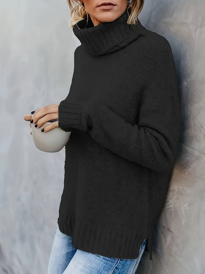 Warm women's turtleneck sweater with stylish split hem, ideal for casual fall fashion.