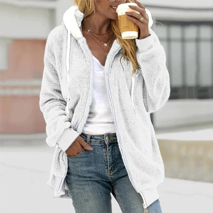 Stylish women's zip-up hooded jacket, long-sleeve, ideal for casual wear & layering.