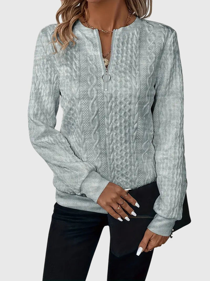 Comfortable women's heather grey quarter-zip cable knit sweater, for daily style.