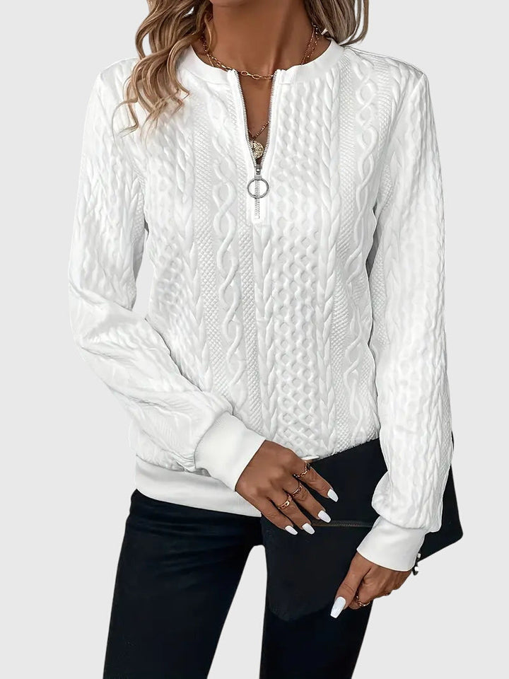 Stylish women's black cable knit quarter-zip sweater, ideal for athleisure & everyday wear.