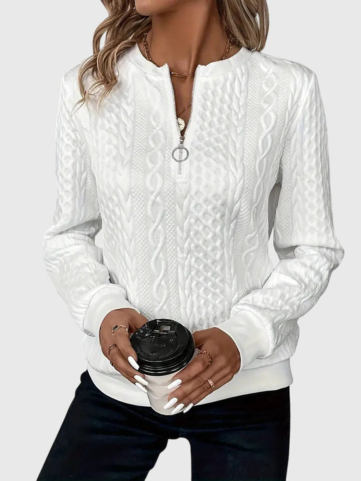 Cozy women's red cable knit pullover sweater, quarter-zip for adjustable comfort & warmth.